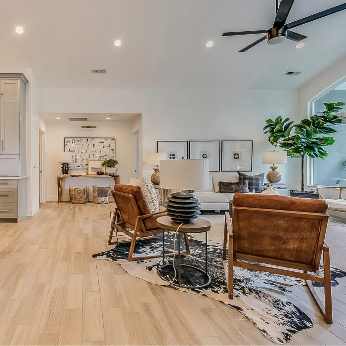Wood floor in beautiful living room and kitchen of open floor plan home